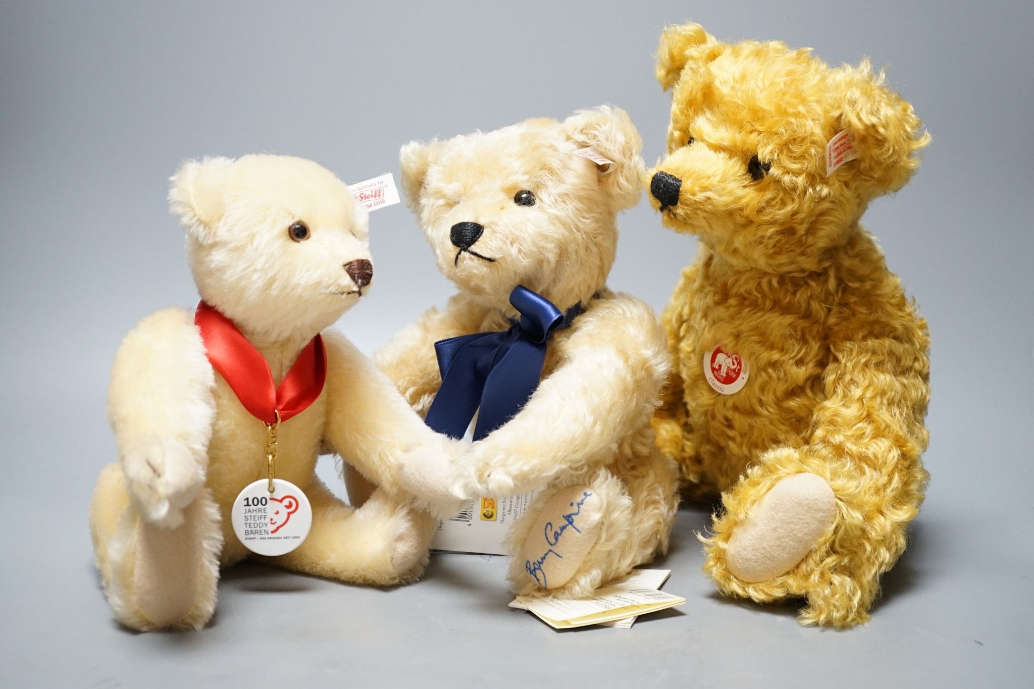 A Side-To-Side Steiff bear, white label, 35cm, box / certificate, together with an Anniversary Bear Box 25cm. a Steiff Bunny Campione bear with box and certificate, 28cm